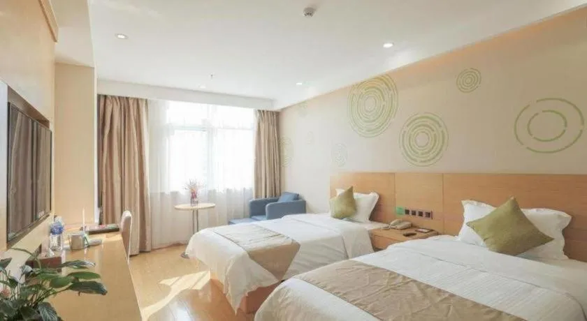 Bed in GreenTree Inn Zhangjiagang Yangshe Old Street Stadium