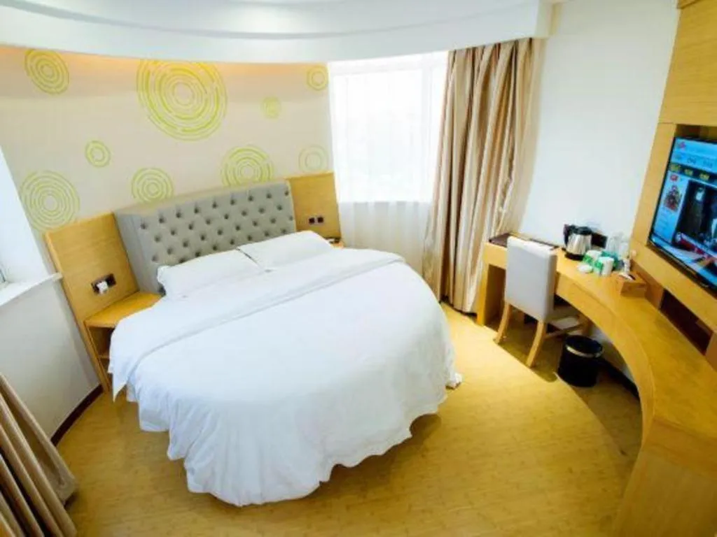 Bed in GreenTree Inn Zhangjiagang Yangshe Old Street Stadium