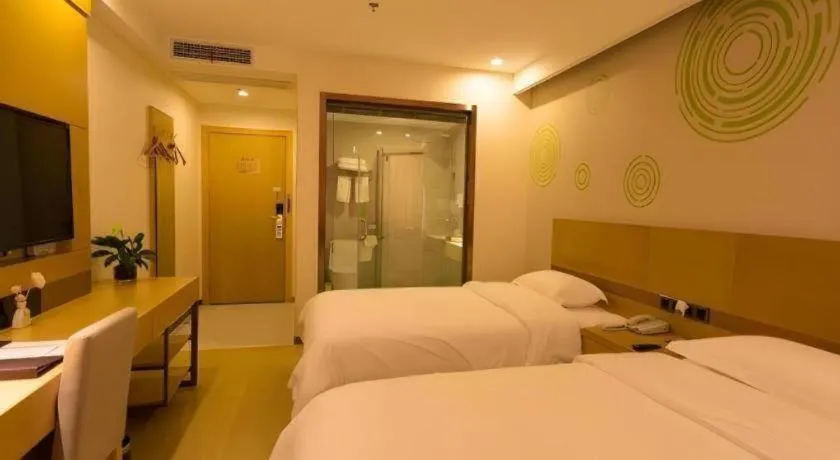 Bed in GreenTree Inn Zhangjiagang Yangshe Old Street Stadium