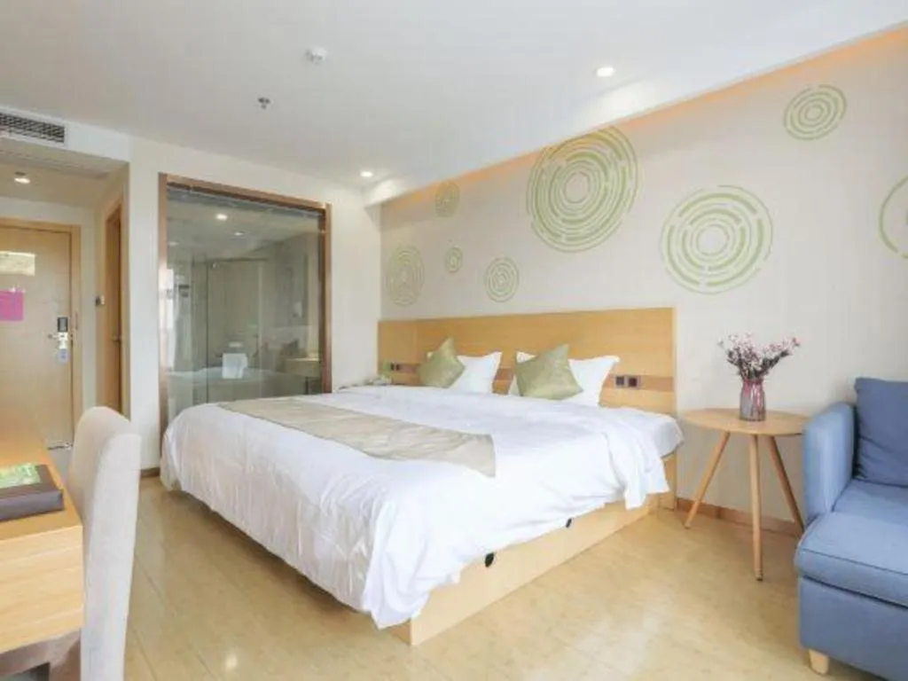 Bed in GreenTree Inn Zhangjiagang Yangshe Old Street Stadium