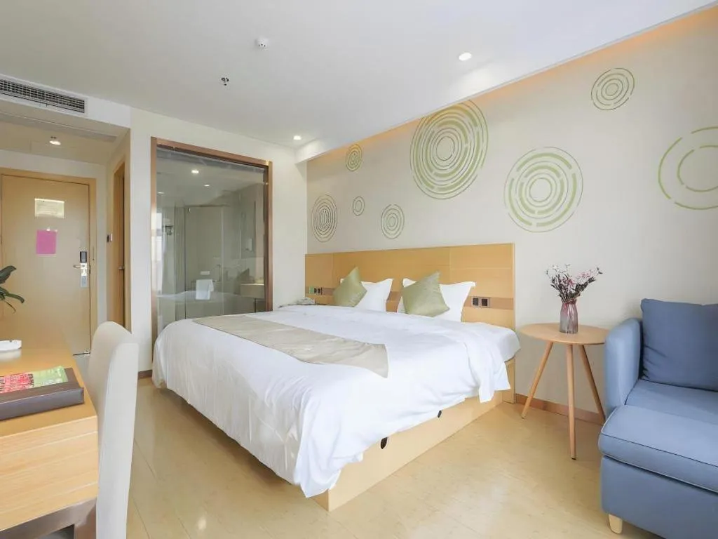 Bed in GreenTree Inn Zhangjiagang Yangshe Old Street Stadium