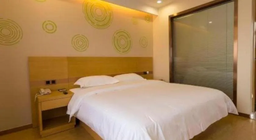 Bed in GreenTree Inn Zhangjiagang Yangshe Old Street Stadium