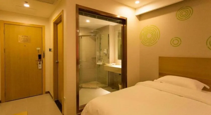 Bed in GreenTree Inn Zhangjiagang Yangshe Old Street Stadium