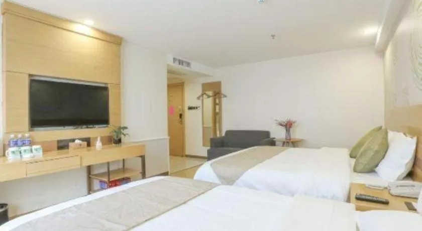 Bed in GreenTree Inn Zhangjiagang Yangshe Old Street Stadium