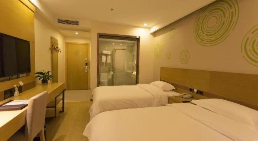 Bed in GreenTree Inn Zhangjiagang Yangshe Old Street Stadium