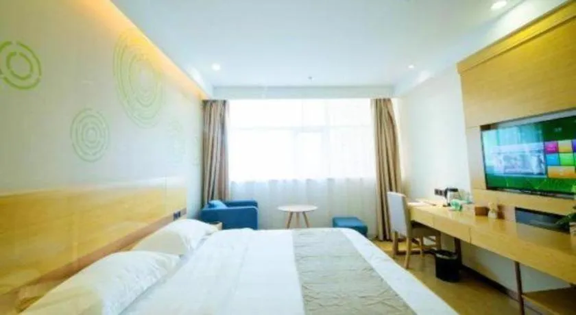 Bed in GreenTree Inn Zhangjiagang Yangshe Old Street Stadium