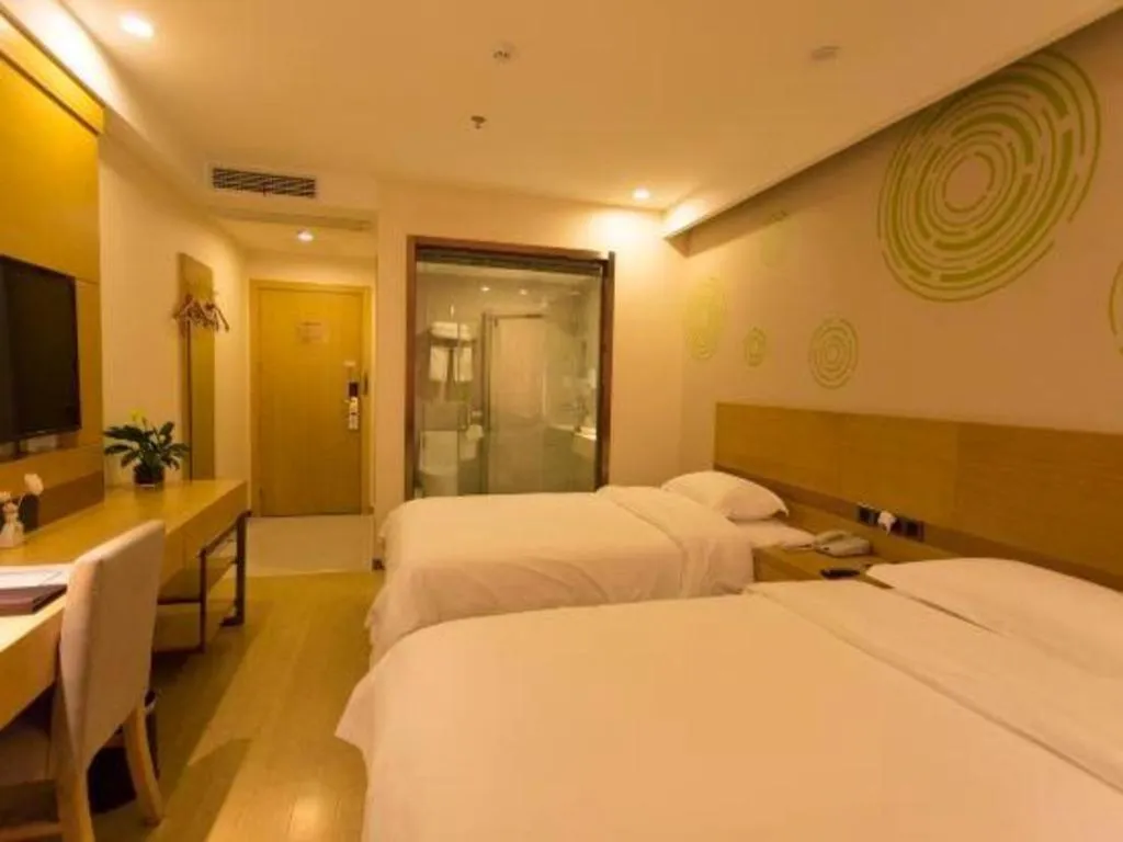 Bed in GreenTree Inn Zhangjiagang Yangshe Old Street Stadium