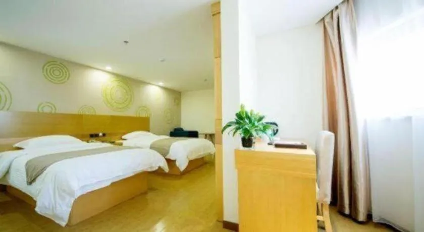 Bed in GreenTree Inn Zhangjiagang Yangshe Old Street Stadium