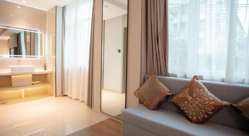 Bed in GYA Shanghai Jiangpu Hotel