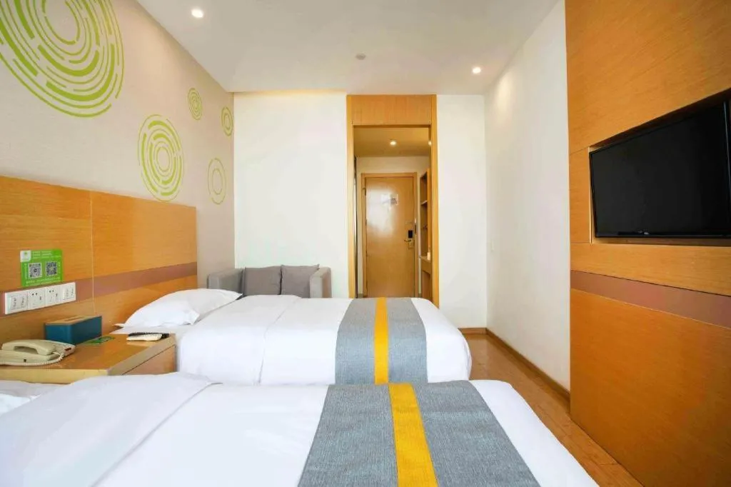 Bed in GreenTree Inn Shanghai National Convention and Exhibition Center Huaxiang Road
