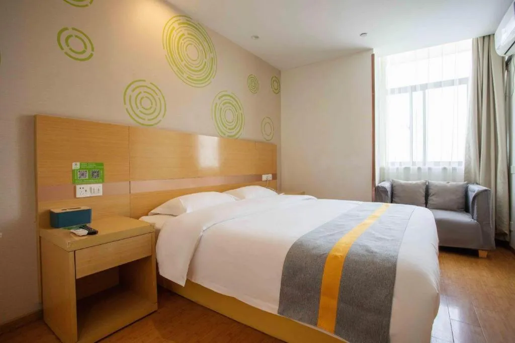 Bed in GreenTree Inn Shanghai National Convention and Exhibition Center Huaxiang Road