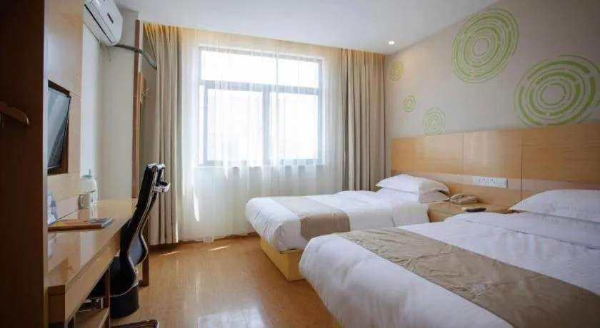 Bed in GreenTree Inn Shanghai National Convention and Exhibition Center Huaxiang Road