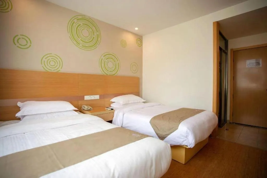 Bed in GreenTree Inn Shanghai National Convention and Exhibition Center Huaxiang Road