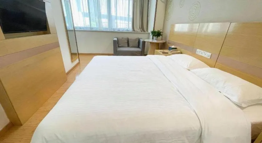 Bed in GreenTree Inn Shanghai National Convention and Exhibition Center Huaxiang Road