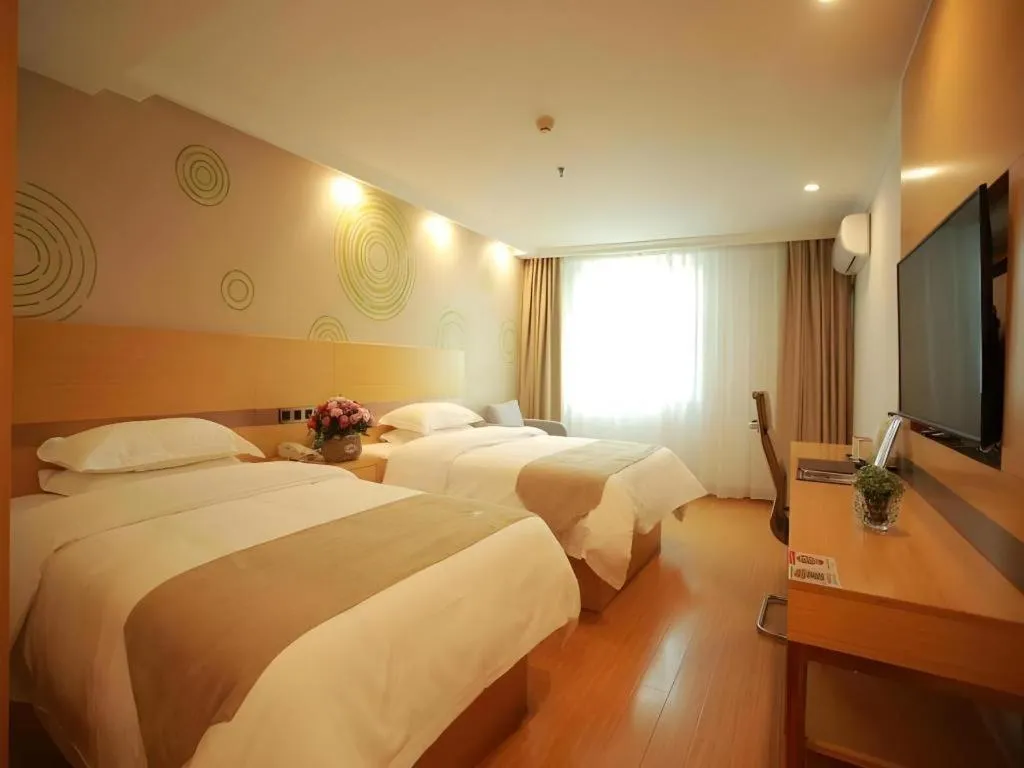 Bed in GreenTree Inn Shanghai National Convention and Exhibition Center Huaxiang Road