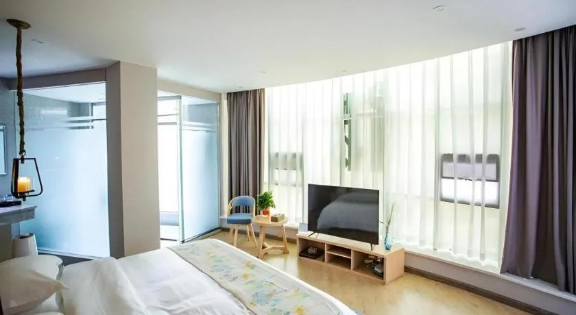 Bed in VX Dali Erhai Park Seascape Hotel