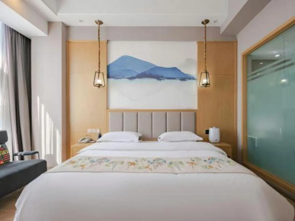 Bed in VX Dali Erhai Park Seascape Hotel