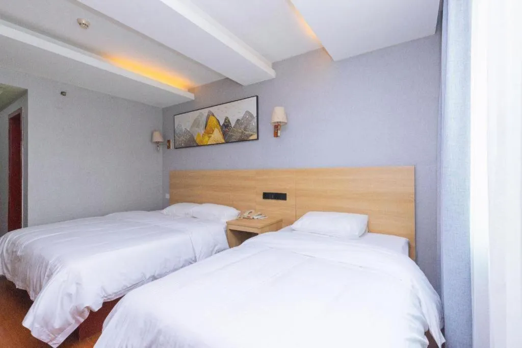 Bed in GreenTree Inn Chongqing Longhu Times Tianjie Xietaizi Metro Station