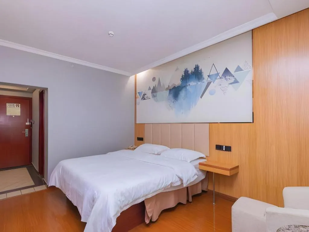 Bed in GreenTree Inn Chongqing Longhu Times Tianjie Xietaizi Metro Station