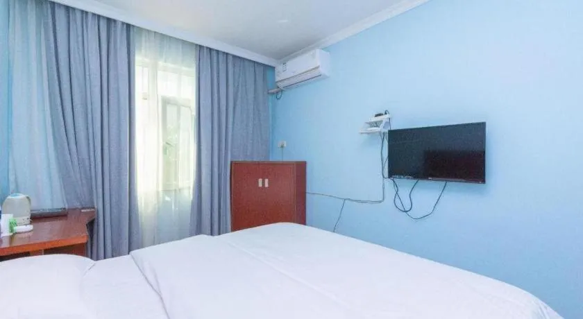 Bed in GreenTree Inn Chongqing Longhu Times Tianjie Xietaizi Metro Station