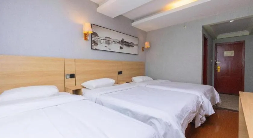 Bed in GreenTree Inn Chongqing Longhu Times Tianjie Xietaizi Metro Station