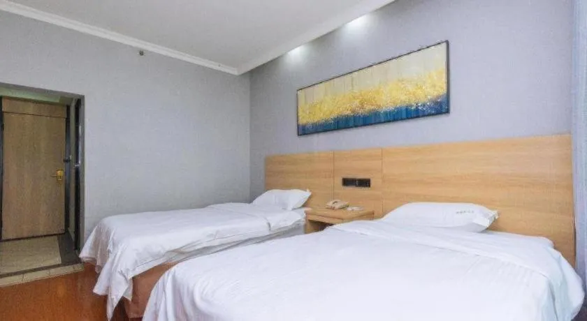 Bed in GreenTree Inn Chongqing Longhu Times Tianjie Xietaizi Metro Station