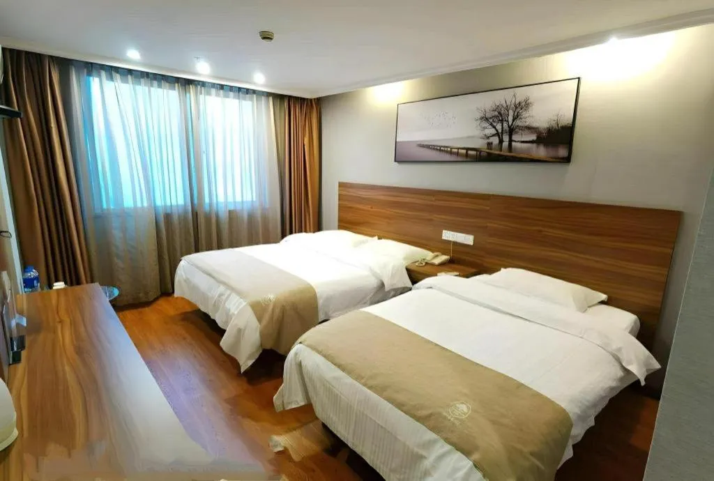 Bed in GreenTree Inn Chongqing Longhu Times Tianjie Xietaizi Metro Station