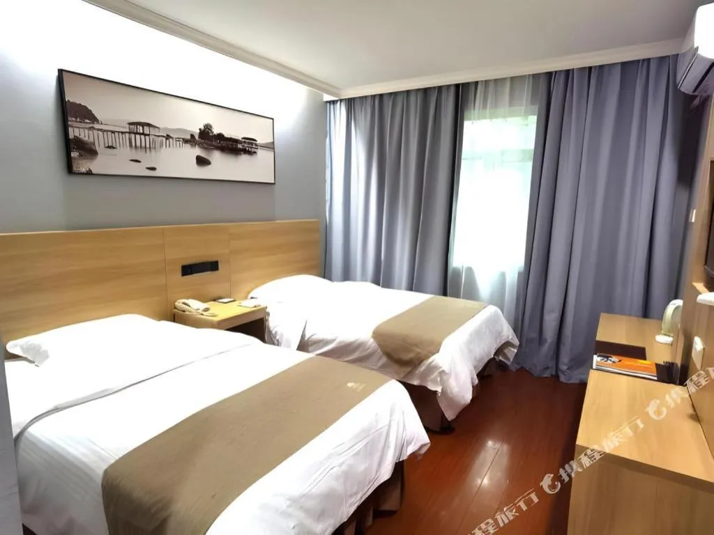 Bed in GreenTree Inn Chongqing Longhu Times Tianjie Xietaizi Metro Station