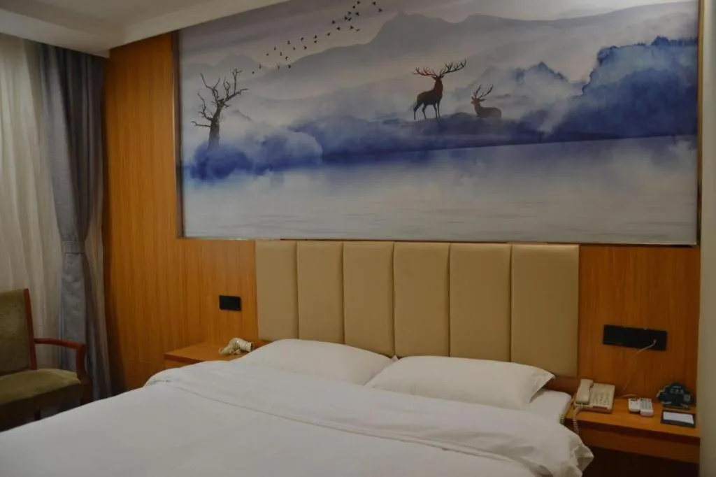 Bed in GreenTree Inn Chongqing Longhu Times Tianjie Xietaizi Metro Station