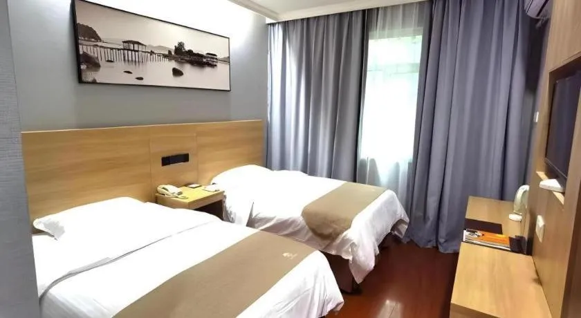 Bed in GreenTree Inn Chongqing Longhu Times Tianjie Xietaizi Metro Station