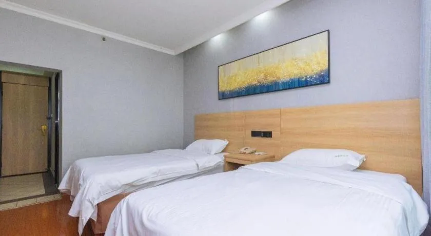 Bed in GreenTree Inn Chongqing Longhu Times Tianjie Xietaizi Metro Station