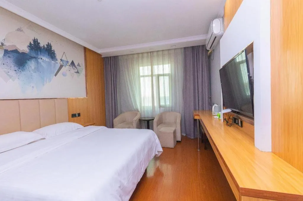 Bed in GreenTree Inn Chongqing Longhu Times Tianjie Xietaizi Metro Station