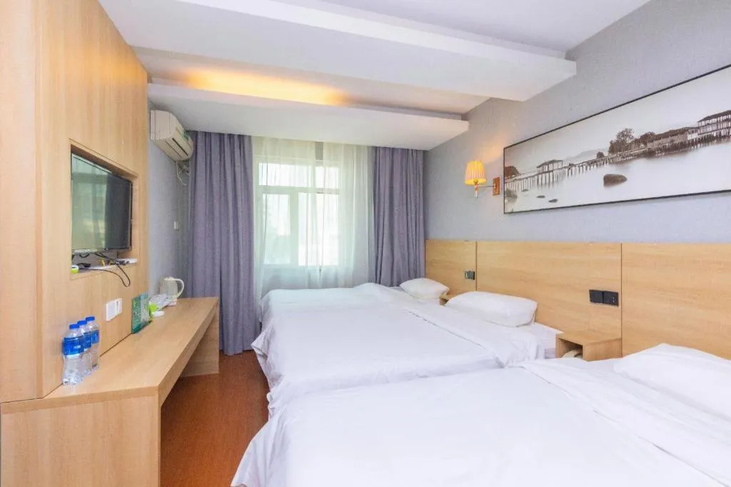 Bed in GreenTree Inn Chongqing Longhu Times Tianjie Xietaizi Metro Station