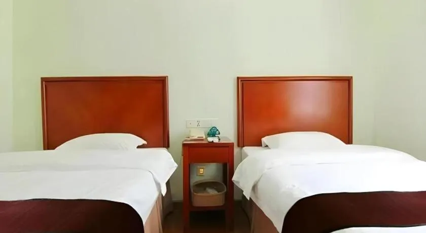 Bed in GreenTree Inn Chongqing Longhu Times Tianjie Xietaizi Metro Station