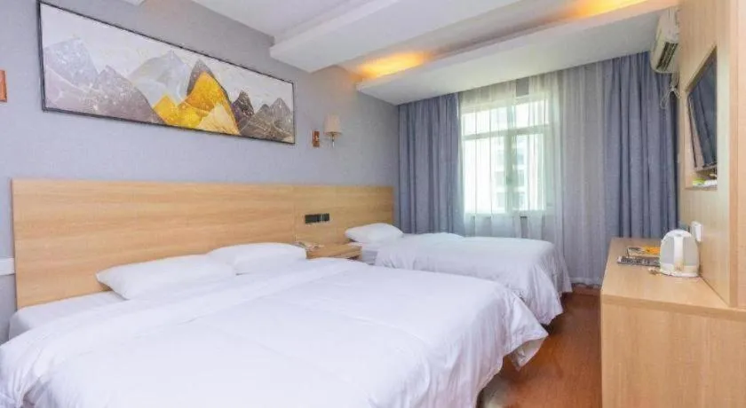 Bed in GreenTree Inn Chongqing Longhu Times Tianjie Xietaizi Metro Station