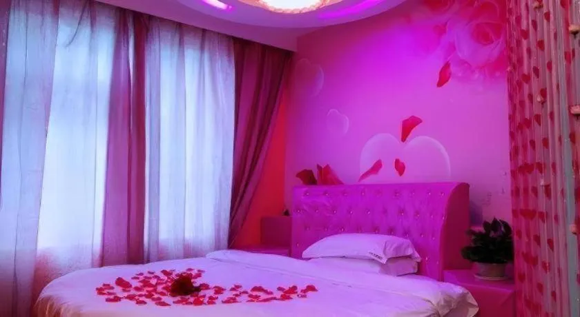 Bed in Shell Ganzhou Central Theme Hotel