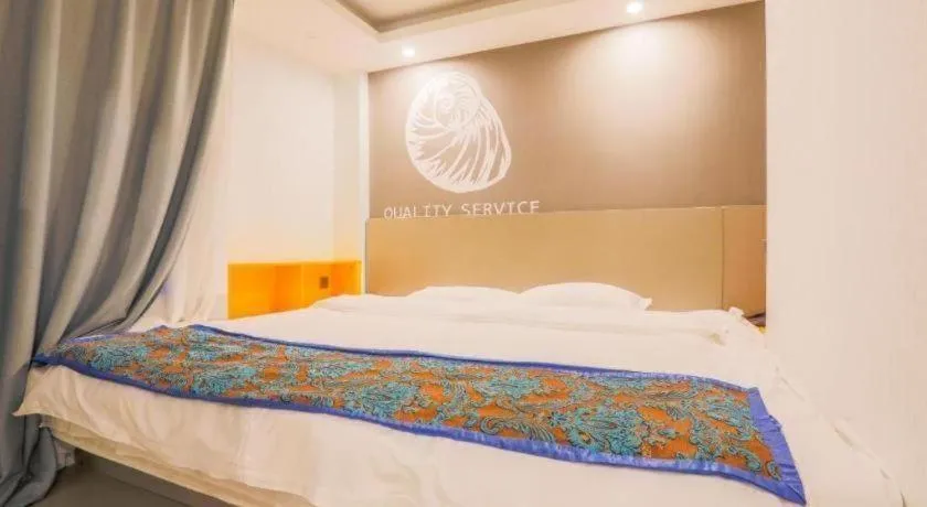 Bed in Shell Ganzhou Central Theme Hotel