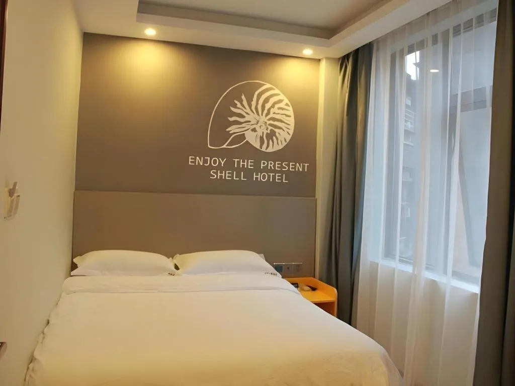Bed in Shell Ganzhou Central Theme Hotel