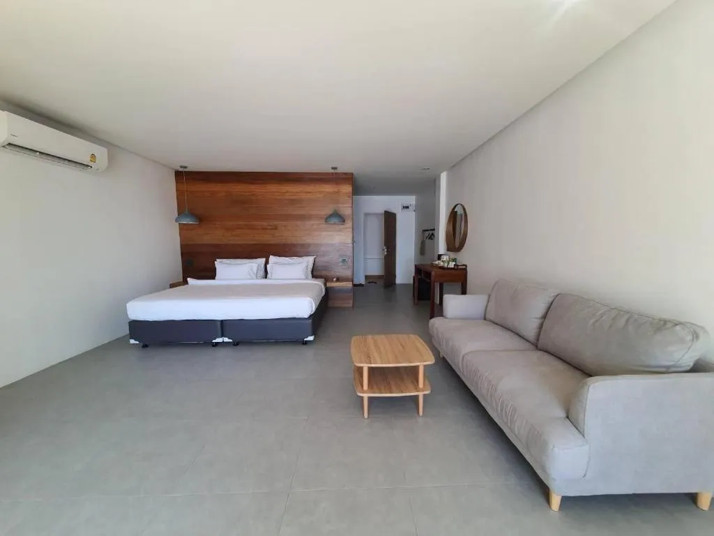 Bed in Rattana Pura Beach Resort