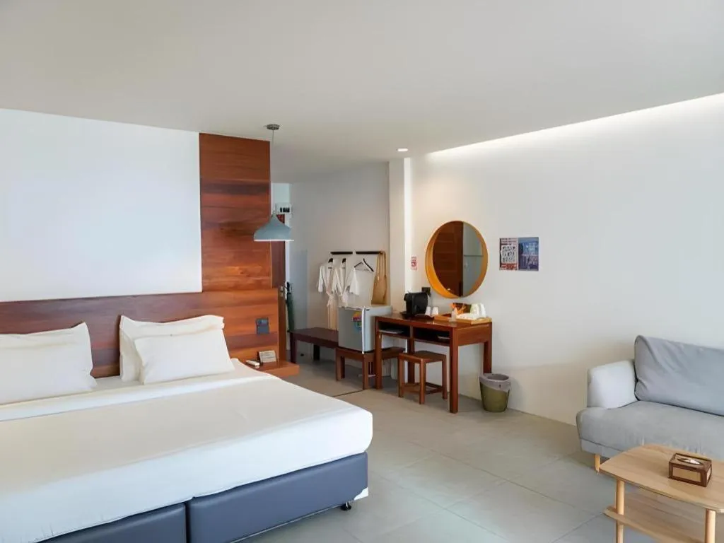 Bed in Rattana Pura Beach Resort