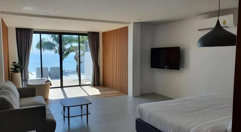 Bed in Rattana Pura Beach Resort