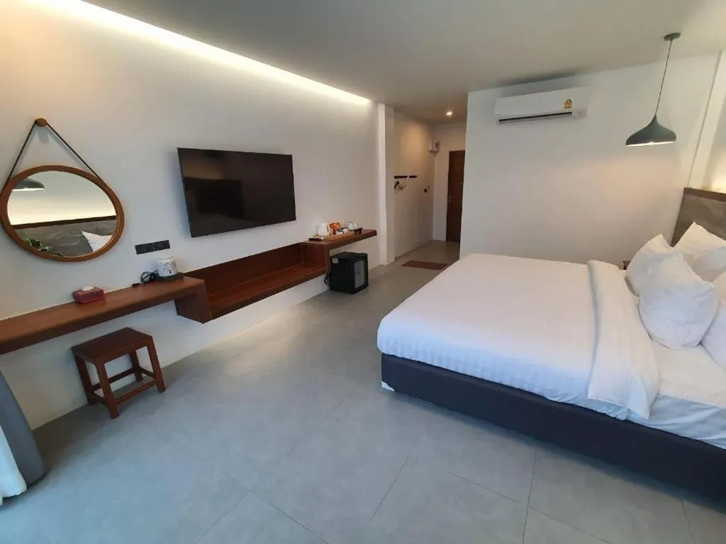 Bed in Rattana Pura Beach Resort