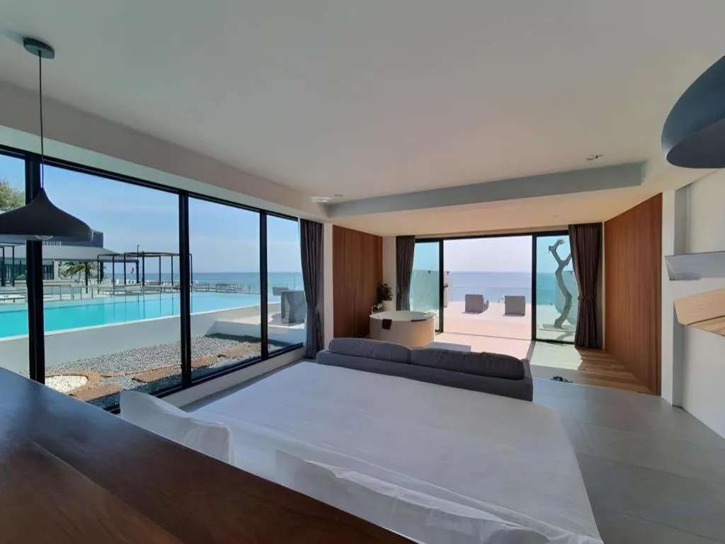 Bed in Rattana Pura Beach Resort