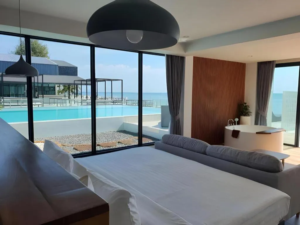 Bed in Rattana Pura Beach Resort