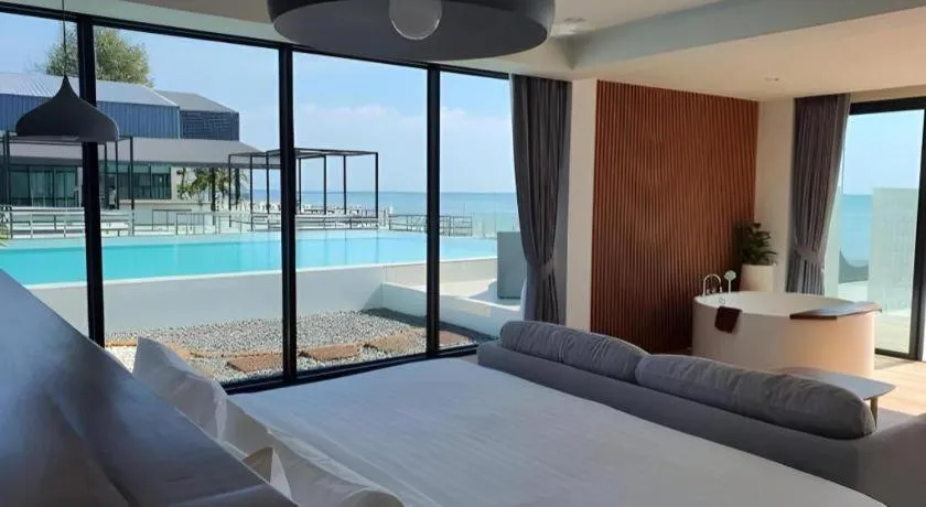 Bed in Rattana Pura Beach Resort