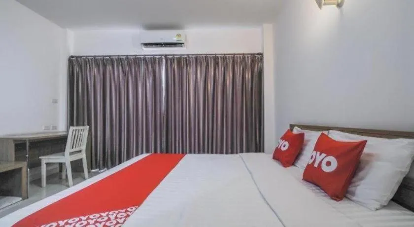 Bed in Super OYO 662 Malee Bunga Hotel
