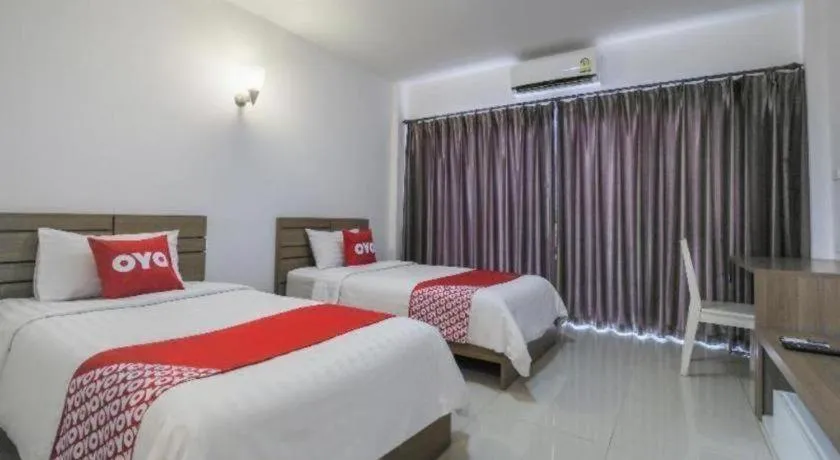Bed in Super OYO 662 Malee Bunga Hotel