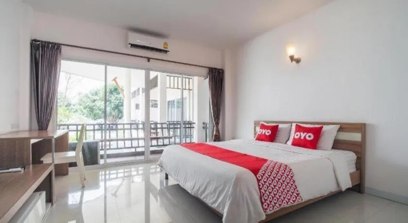 Bed in Super OYO 662 Malee Bunga Hotel