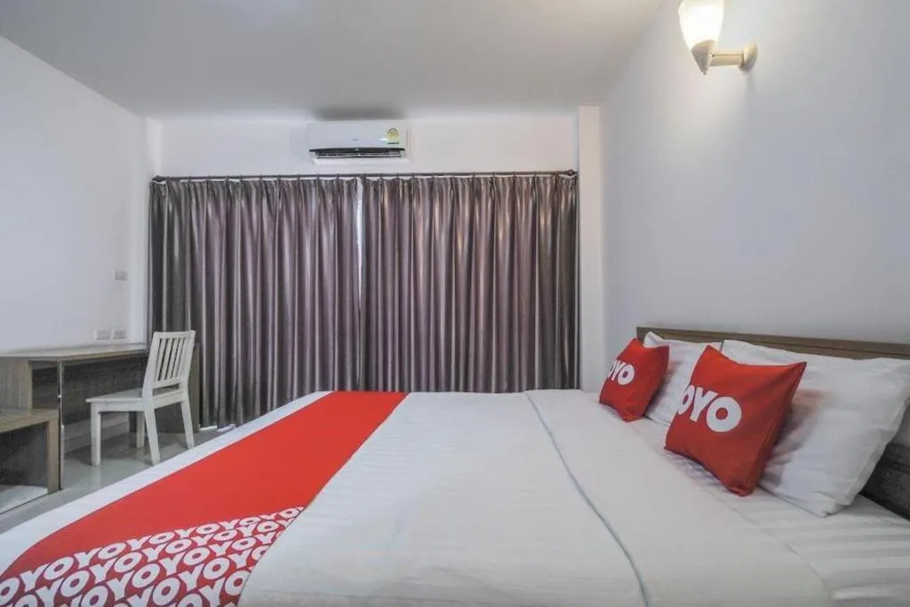 Bed in Super OYO 662 Malee Bunga Hotel