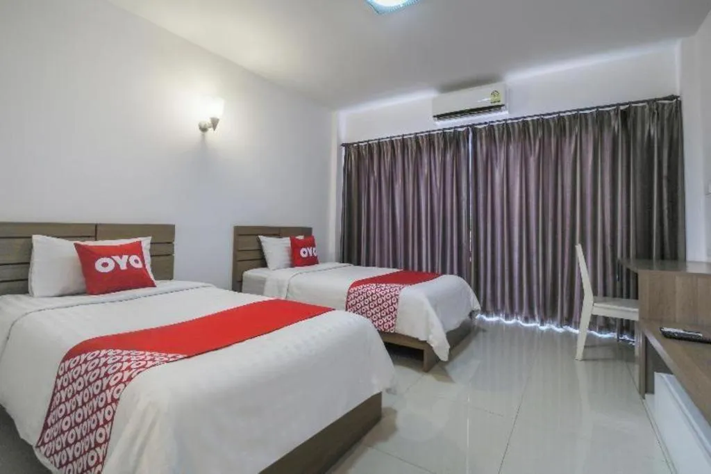 Bed in Super OYO 662 Malee Bunga Hotel